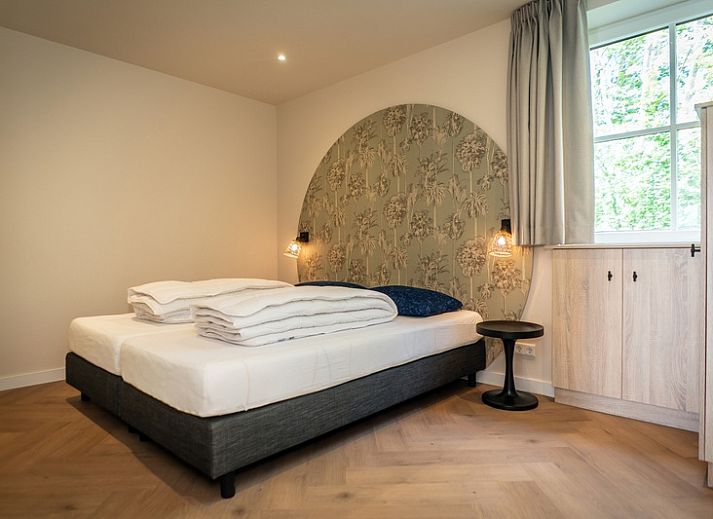 Vakantiehuis Villa 25a, De Koog, Texel met terras en groene omgeving op de Waddeneilanden.