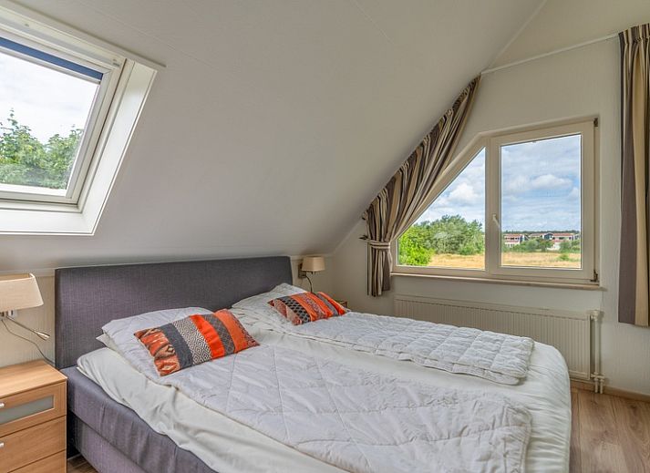 Ruime oprit van Vakantiehuis Kamperfoelie 69 in De Koog, Texel. Perfecte toegang tot deze comfortabele vakantiewoning op de Waddeneilanden.