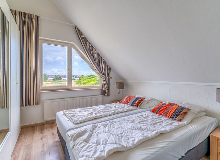 Ruime oprit van Vakantiehuis Kamperfoelie 69 in De Koog, Texel. Perfecte toegang tot deze comfortabele vakantiewoning op de Waddeneilanden.