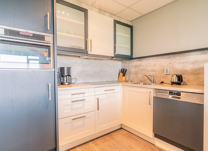 Einladende Sitzecke im Appartement Juliana 028 Zeezicht, De Koog, Texel mit Meerblick.