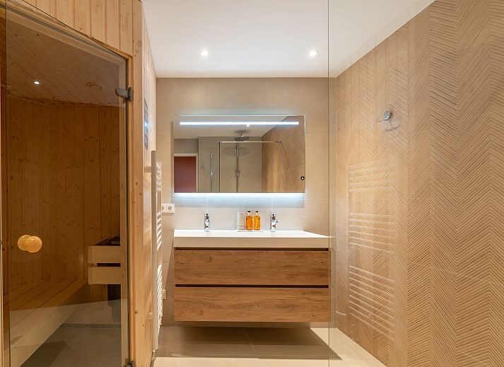 Einladende Sitzecke im Appartement Juliana 028 Zeezicht, De Koog, Texel mit Meerblick.