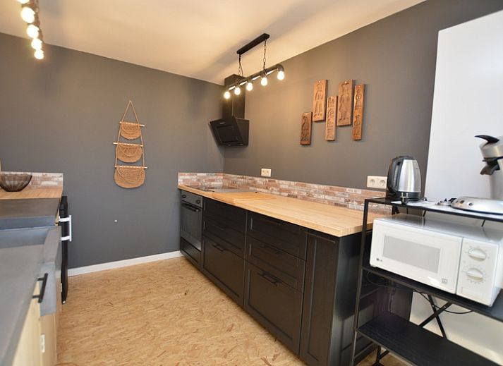 Gemuetliches Wohnzimmer Ferienhaus Hoog Koog 8 De Koog Texel mit Naturdekor