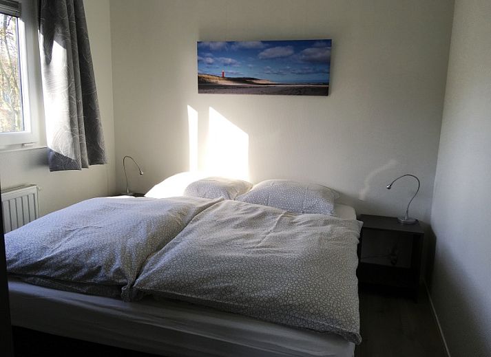 Chalet Elsrijk in De Koog, Texel: Geniet van een zonnig terras en moderne inrichting in dit vakantiehuis op de Waddeneilanden.