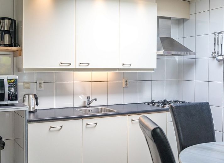 Terras van vakantiehuis Zeelucht in De Koog, Texel met comfortabele zitgelegenheid.