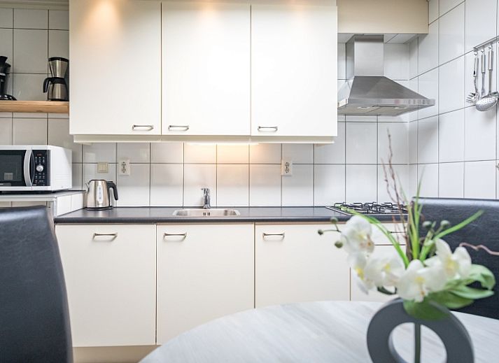 Terras van vakantiehuis Zeelucht in De Koog, Texel met comfortabele zitgelegenheid.