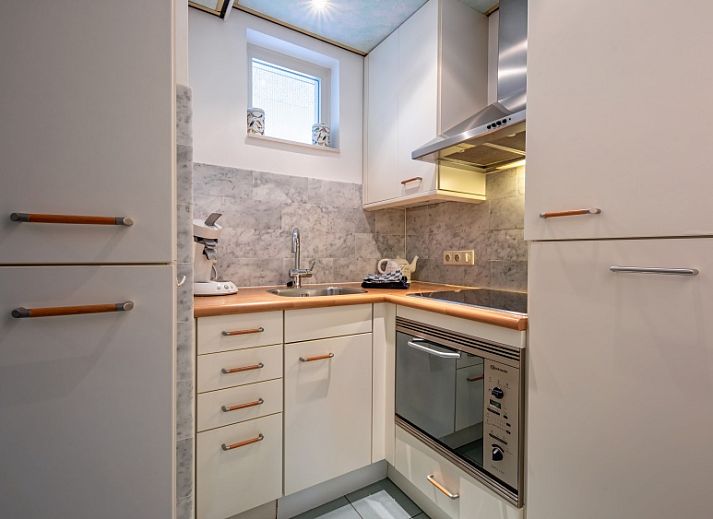 Luchtfoto van Resort De Buteriggel - Appartement 9, gelegen aan het strand in De Koog, Texel, Waddeneilanden.