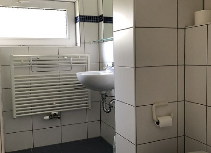 Vakantiehuis Bungalow Oud Vredelust 85 in De Koog Texel met groene entree.