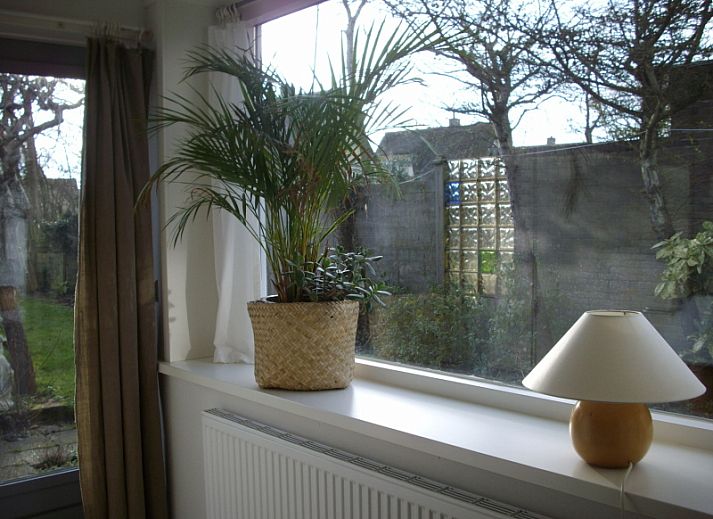 Comfortabele woonkamer in Plevierstraat 21, De Koog, Texel, vakantiehuis met knusse zitruimte op de Waddeneilanden.