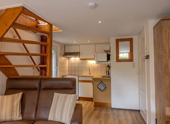 Gezellige tuin bij Karekiet in De Koog, Texel, ideaal voor ontspanning.