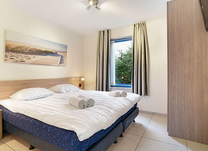 Beach Park Texel 4-persoons villa 4L1 in De Koog met zonnige veranda en groene omgeving op Texel.