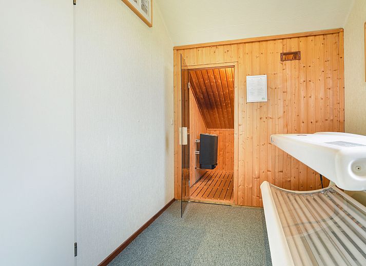 Gezellige woonkamer van Beach Park Texel 4-persoons villa 4L1 in De Koog, Texel met comfortabele zitruimte.