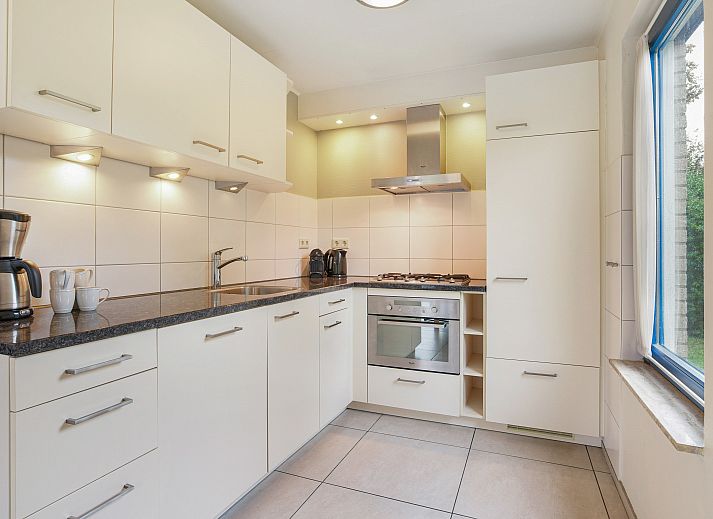 Gezellige woonkamer van Beach Park Texel 4-persoons villa 4L1 in De Koog, Texel met comfortabele zitruimte.