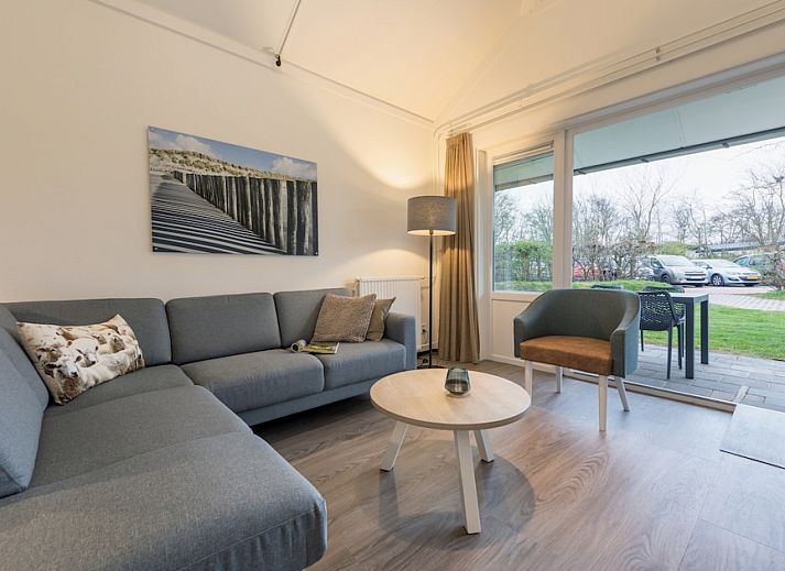 Geniet van de rust bij T4M Comfort, een charmante bungalow in De Koog, Texel, met een zonnig terras en groene omgeving op de Waddeneilanden.