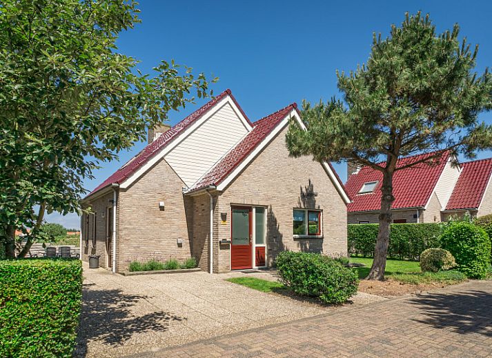 Villa 6 personen in De Koog Texel, vakantiehuis met zonnig terras en groene omgeving op de Waddeneilanden.