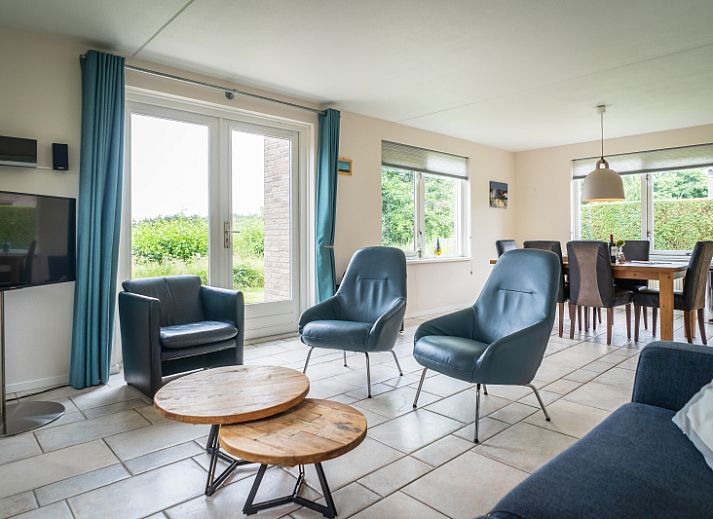 Villa 6 personen in De Koog Texel, vakantiehuis met zonnig terras en groene omgeving op de Waddeneilanden.