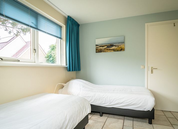 Charmante entree van Villa 6 personen in De Koog Texel, omgeven door natuur op de Waddeneilanden.