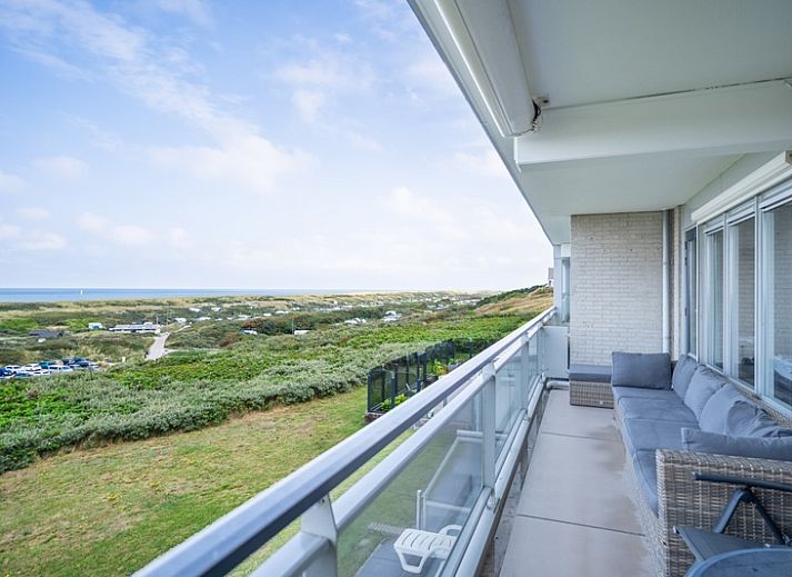 Comfortabele zithoek met panoramisch uitzicht in Appartement Juliana 102 Zeezicht, Texel.