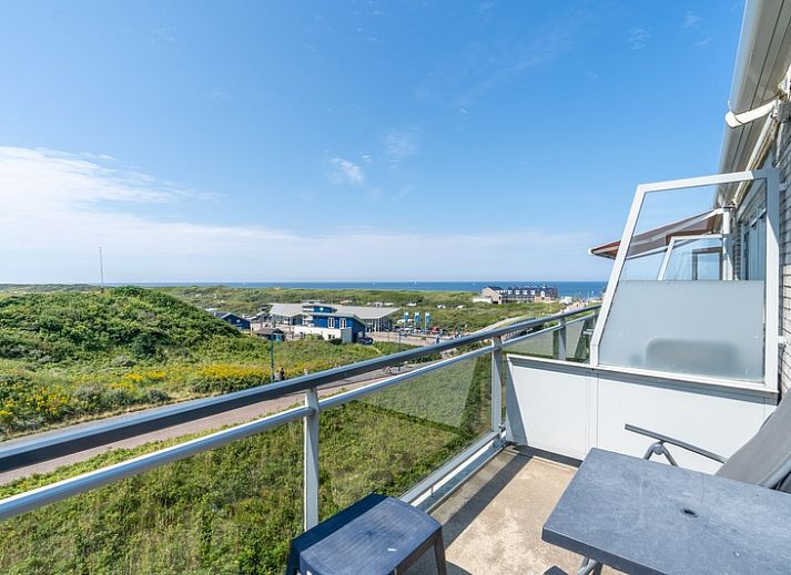 Cozy sitting area in Apartment Juliana 094 Island and Sea View, De Koog, Texel overlooking dunes and sea.