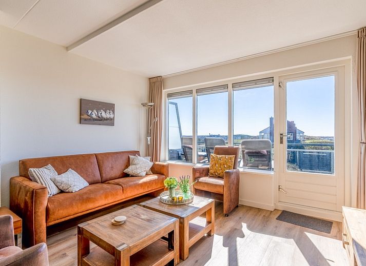 Gemuetliches Wohnzimmer im Apartment Juliana 098 Insel- und Meerblick, De Koog, Texel mit Meerblick.