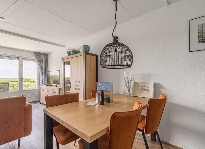 Gezellige zithoek in Appartement Juliana 096 Eiland en Zeezicht, De Koog, Texel met prachtig uitzicht.