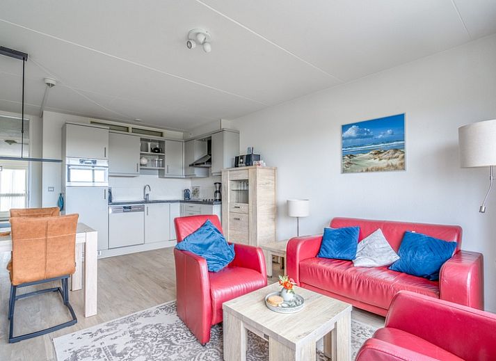 Gezellige woonkamer van Appartement Juliana 138 Eiland en Zeezicht in De Koog, Texel met uitzicht op de Waddeneilanden.