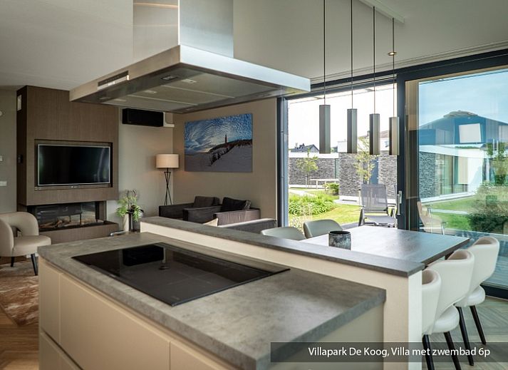 Gemuetliches Wohnzimmer in der luxurioesen Familienvilla mit Schwimmbad, De Koog Texel. Gemuetliche Sitzecke mit modernen Moebeln.