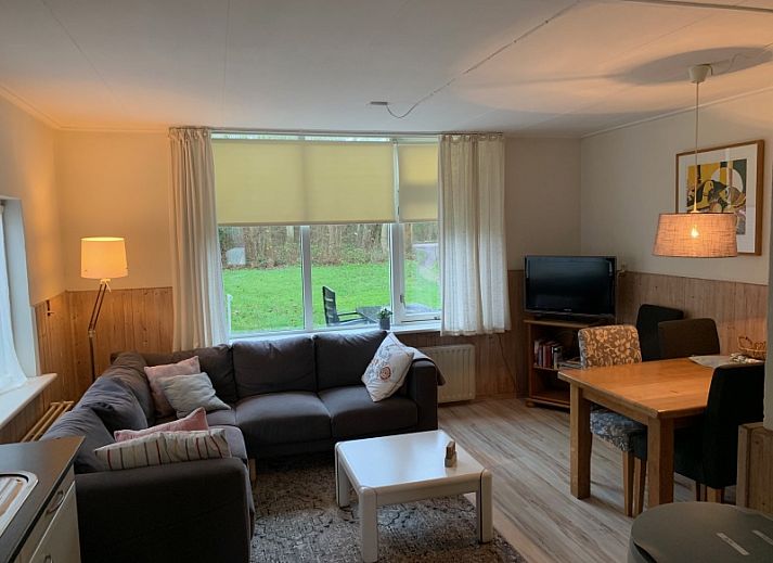 Vakantiehuis 0386 in De Koog Texel met groene tuin en terras voor een ontspannen verblijf op de Waddeneilanden.