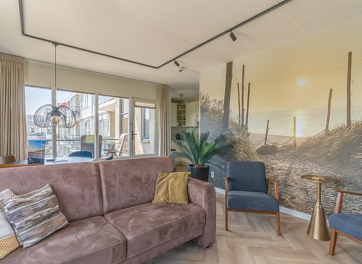 Stylish living room in Apartment Juliana 120 Eilandzicht, De Koog, Texel with modern interior and large windows.