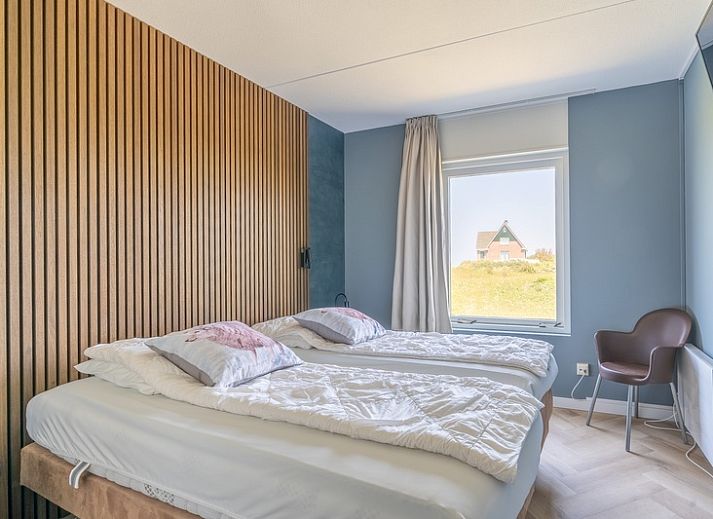 Cozy sitting area in Apartment Juliana 120 Eilandzicht, De Koog, Texel with a view of nature.