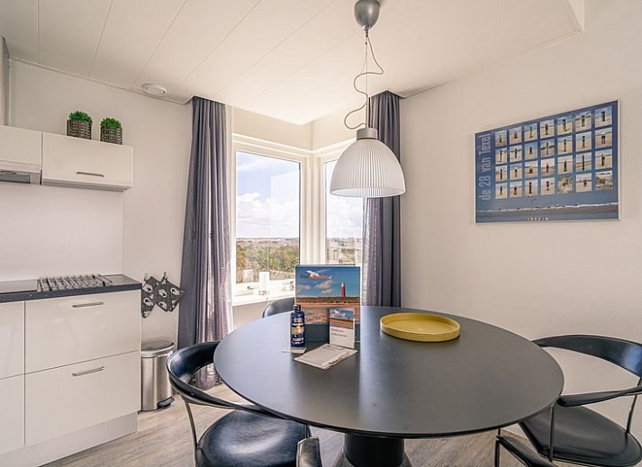 Modern furnished living room of Apartment Juliana 132 Eilandzicht in De Koog, Texel overlooking the dunes.