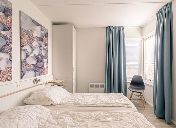 Modern furnished living room of Apartment Juliana 132 Eilandzicht in De Koog, Texel overlooking the dunes.