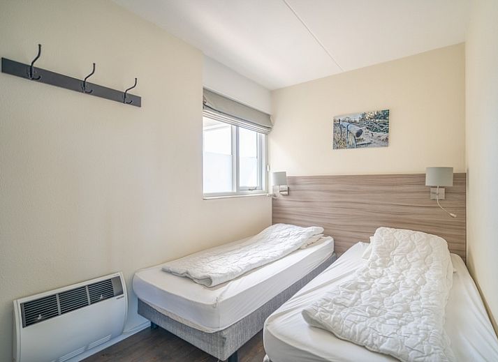 Modern furnished living room of Apartment Juliana 132 Eilandzicht in De Koog, Texel overlooking the dunes.