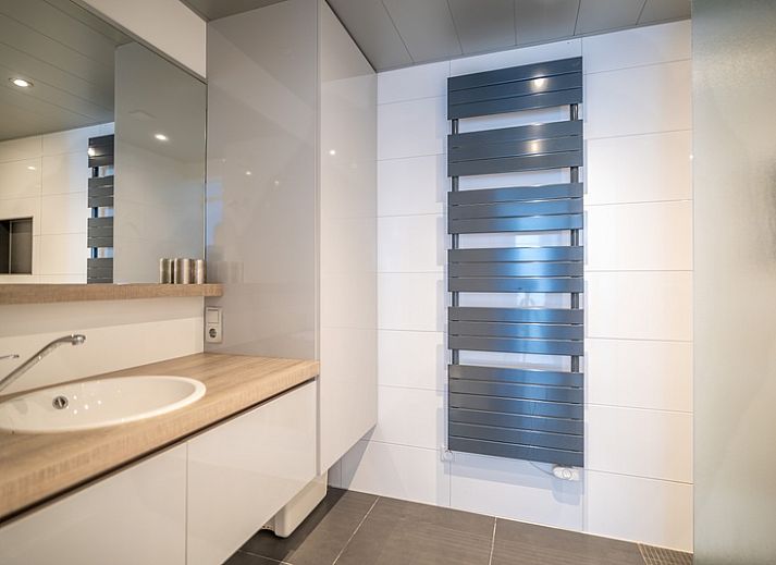 Modern furnished living room of Apartment Juliana 132 Eilandzicht in De Koog, Texel overlooking the dunes.