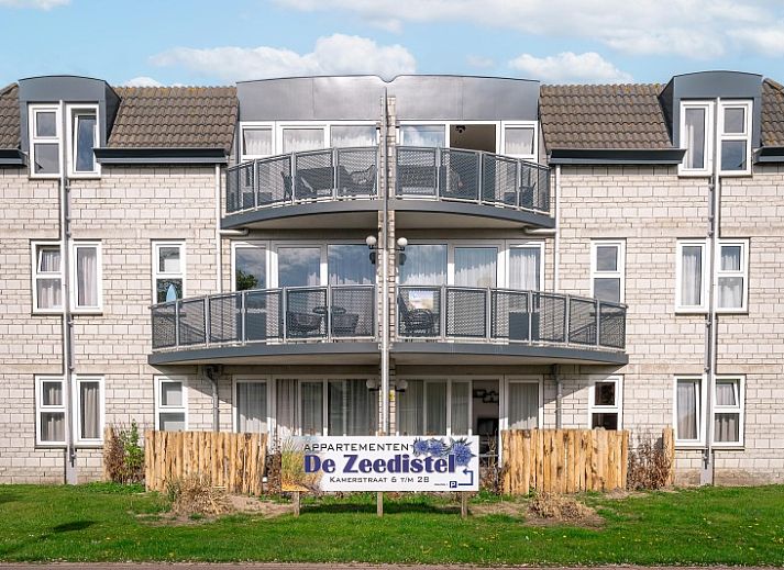 Stijlvolle zithoek in Appartement Zeedistel 28, De Koog, Texel, ideaal voor ontspanning na een dag op de Waddeneilanden.