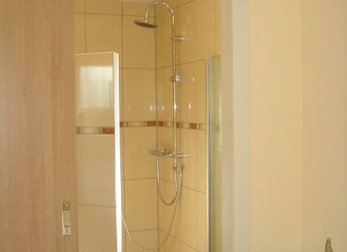 Comfortabele woonkamer in 6-pers. Vakantiehuis met Sauna in De Koog, Texel, Waddeneilanden.