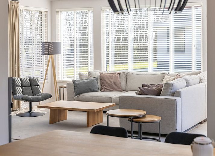 Villa 8, ein luxurioeses Ferienhaus in De Koog, Texel, mit grossem Garten und Terrasse, ideal fuer einen entspannten Aufenthalt auf den Watteninseln.