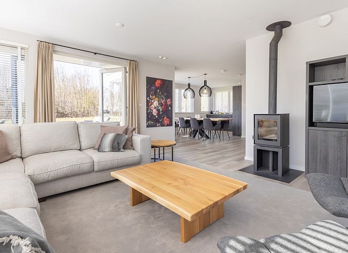 Villa 8, ein luxurioeses Ferienhaus in De Koog, Texel, mit grossem Garten und Terrasse, ideal fuer einen entspannten Aufenthalt auf den Watteninseln.