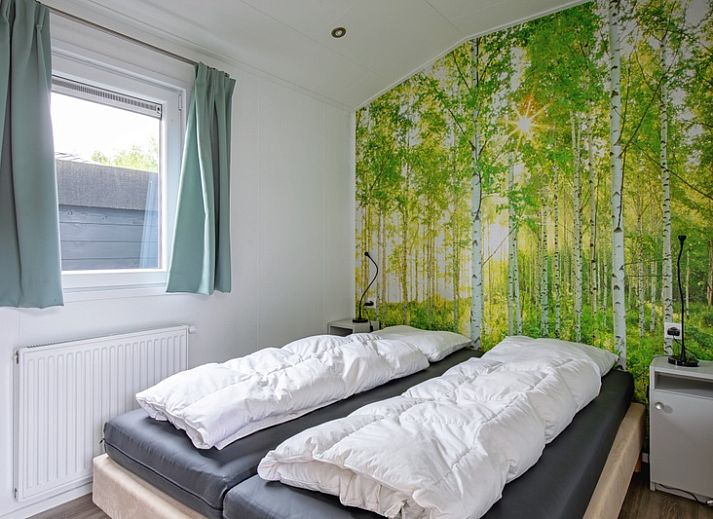 Chaletpark Bregkoog - Chalet Bregkoog 12, De Koog, Texel. Zonovergoten terras bij vakantieaccommodatie op Waddeneilanden.