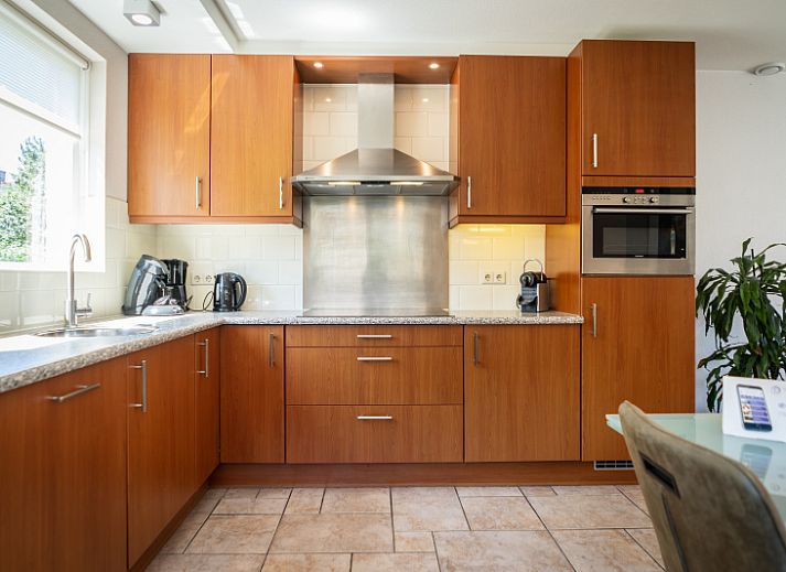 Villa 4 personen in De Koog Texel met zonnig terras en tuin, ideaal voor een ontspannen vakantie op de Waddeneilanden.