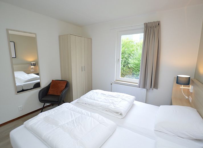 Gezellige woonkamer in Vakantiehuis Stappeland 169, De Koog, Texel met comfortabele banken.