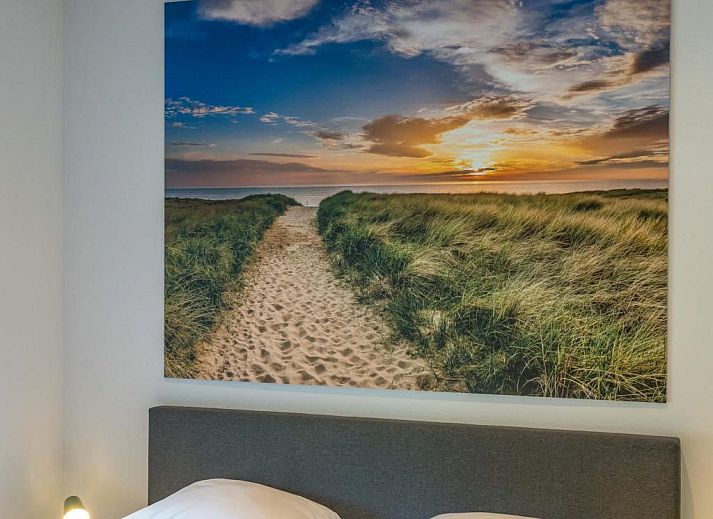 39 - 16B Wulp - BLV, vakantieaccommodatie in De Koog, Texel met terras en gele parasol.