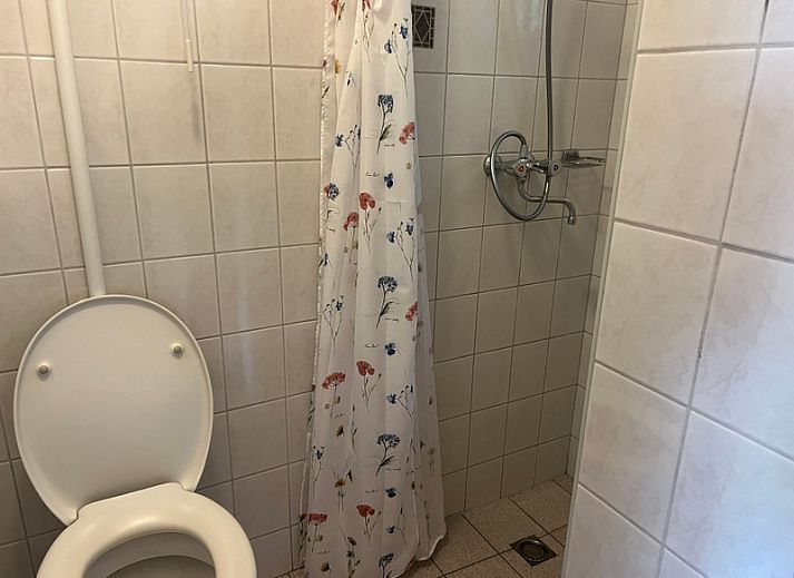 Gezellige woonkamer in Landgoed Springtij - Koetshuis 3, vakantiehuis in De Koog, Texel.