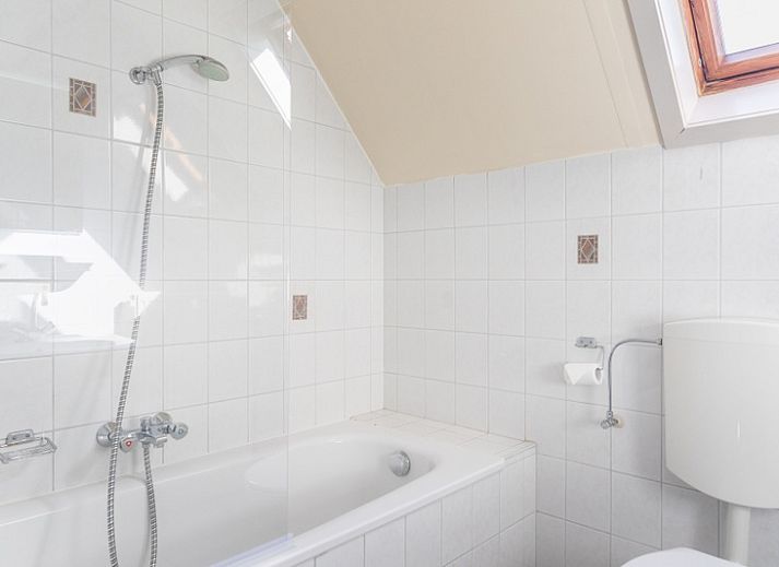 Gezellige woonkamer in Landgoed Springtij - Koetshuis 3, vakantiehuis in De Koog, Texel.