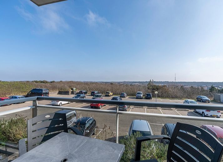 Offene Kueche und Wohnzimmer im Apartment Juliana 124 Eilandzicht, De Koog, Texel mit moderner Einrichtung.