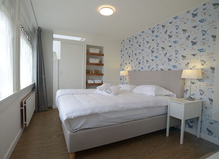 Exterior of Grand Hotel Opduin - Holiday Apartment A in De Koog, Texel, surrounded by natural beauty and bicycle paths.