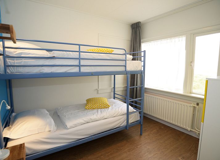 Exterior of Grand Hotel Opduin - Holiday Apartment A in De Koog, Texel, surrounded by natural beauty and bicycle paths.