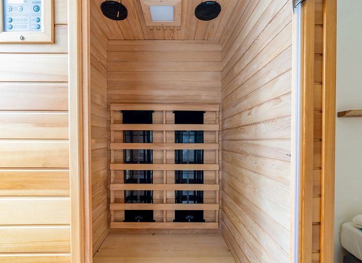 Lichte leefruimte in Appartement Anna 224, vakantieverblijf in De Koog, Texel met moderne inrichting.