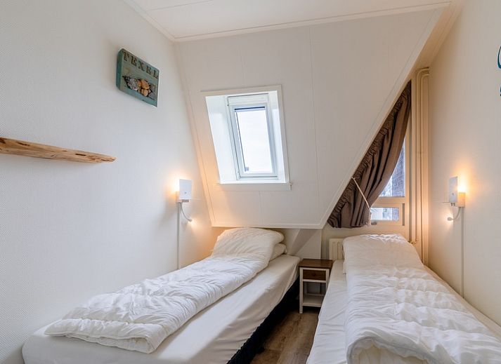 Appartement Anna 224 in De Koog, Texel biedt een ruime woonkamer met uitzicht op de Waddeneilanden.