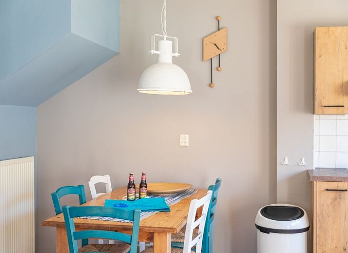 Landgoed Springtij - Koetshuis 2 in De Koog, Texel met charmante buitenkant en groene omgeving.