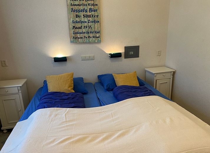 Landgoed Springtij - Koetshuis 2 in De Koog, Texel met charmante buitenkant en groene omgeving.